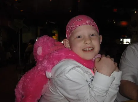 Emmy wearing a pink bandana